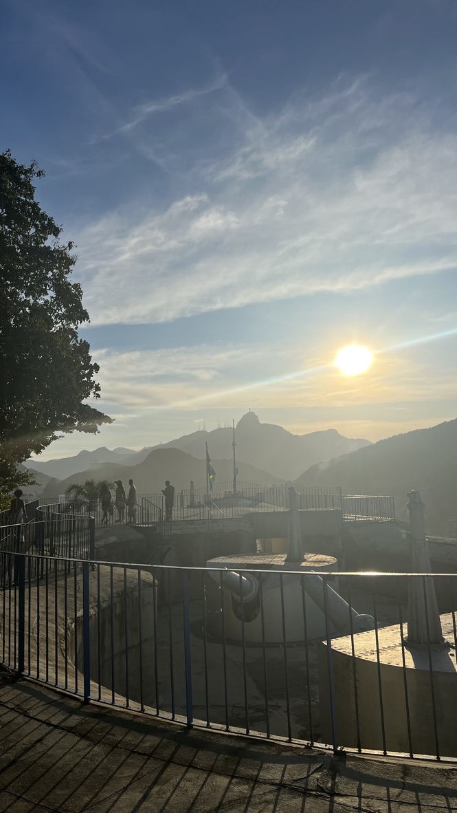 Sunset at the fort lookout with cannons and the Brazilian flag