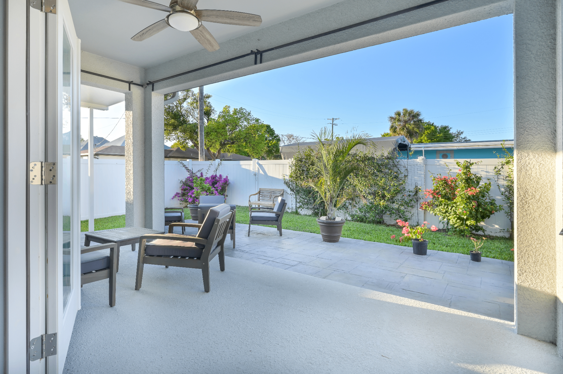 Covered patio opening to the private garden
