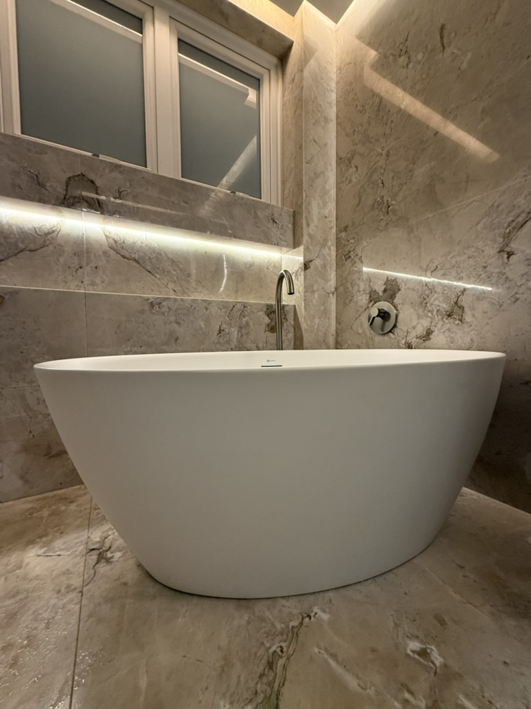 The freestanding tub in the marble ensuite bath.