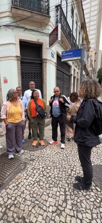 The guide walking with travelers through a street in Rio's Port Zone