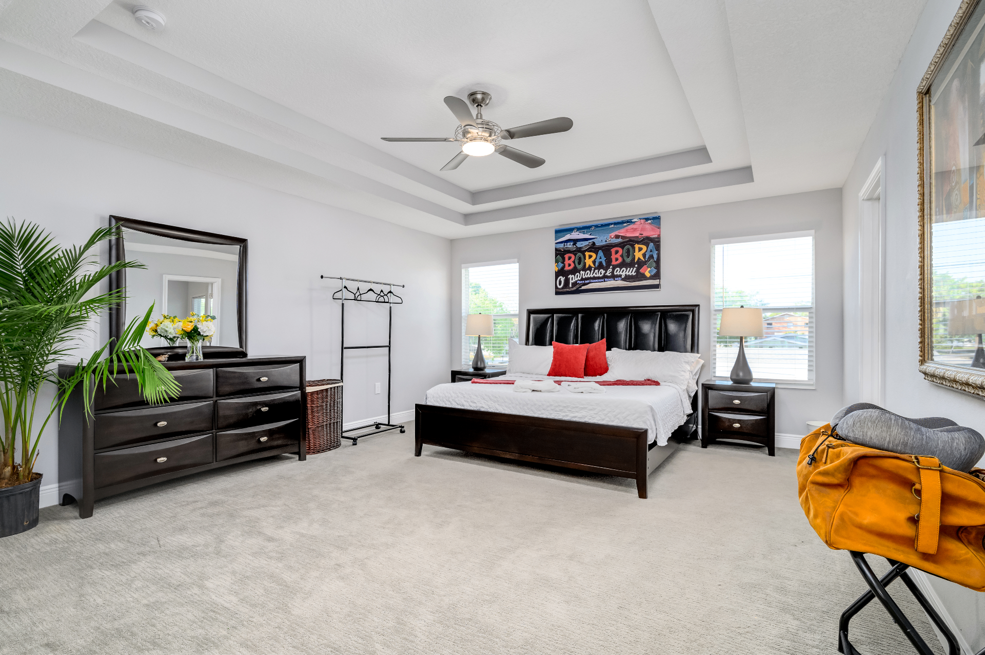 Primary bedroom with tray ceiling