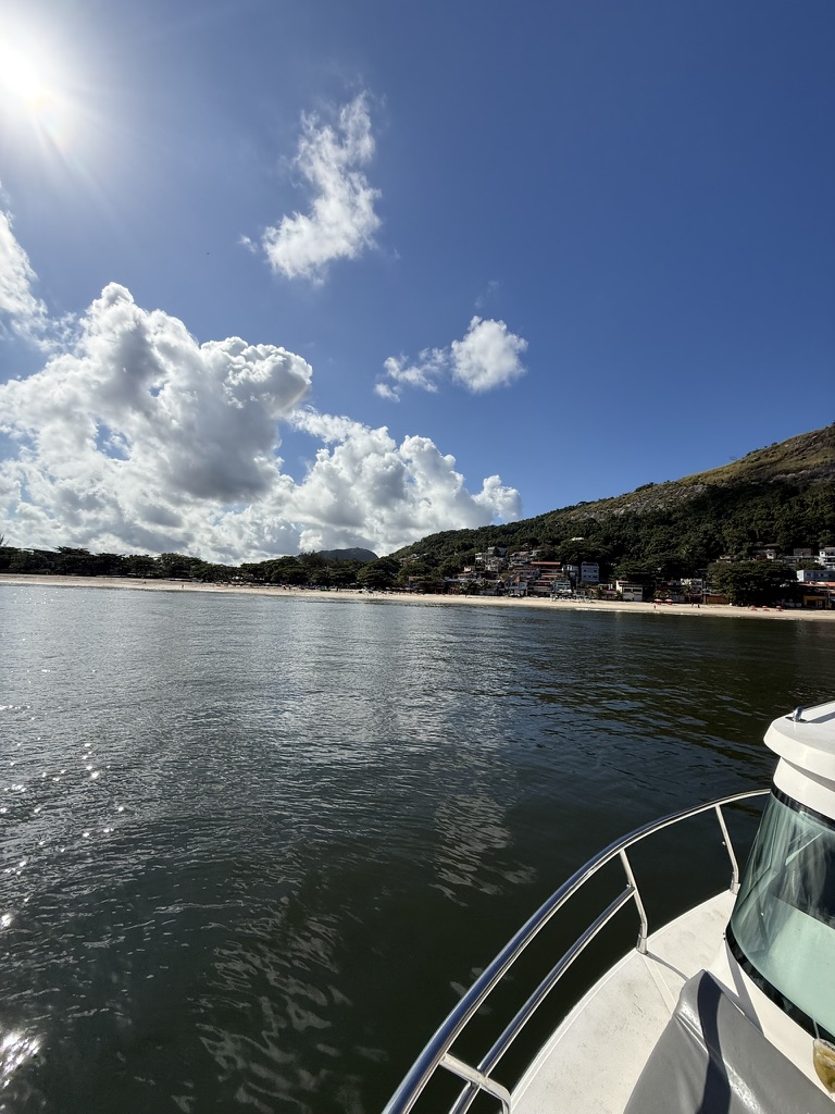 Sun over the water on the approach to a Rio beach