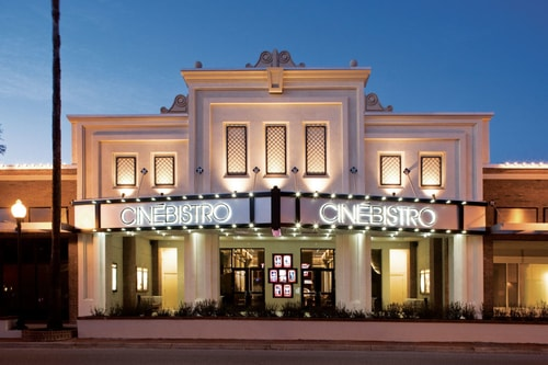 CineBistro in Hyde Park Village, its marquee lit for the evening.